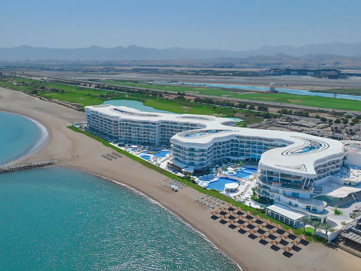 Aerial view of St. Regis Al Mouj Muscat, the beach and the Al Mouj golf course
